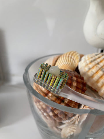 promis toothbrush with toothpaste